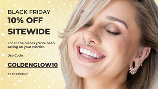Promotional banner for Black Friday sale with a woman wearing jewelry on a polka dot background.