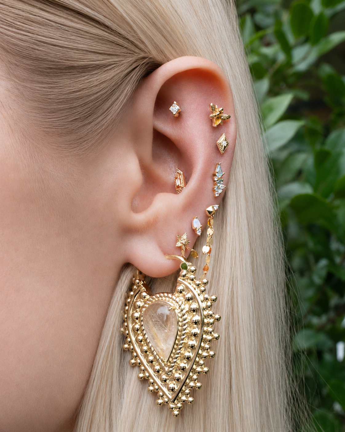 Rutilated quartz ear featuring Nostalgia 16g earrings